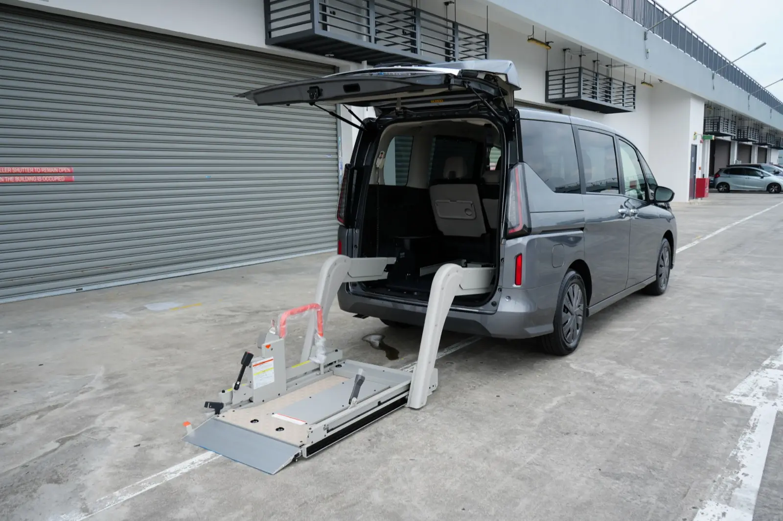 Ramp extended from the rear with the tailgate open